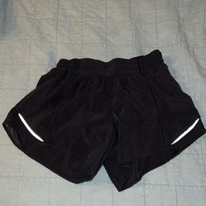 Black lululemon hotty hot shorts - size 4 tall